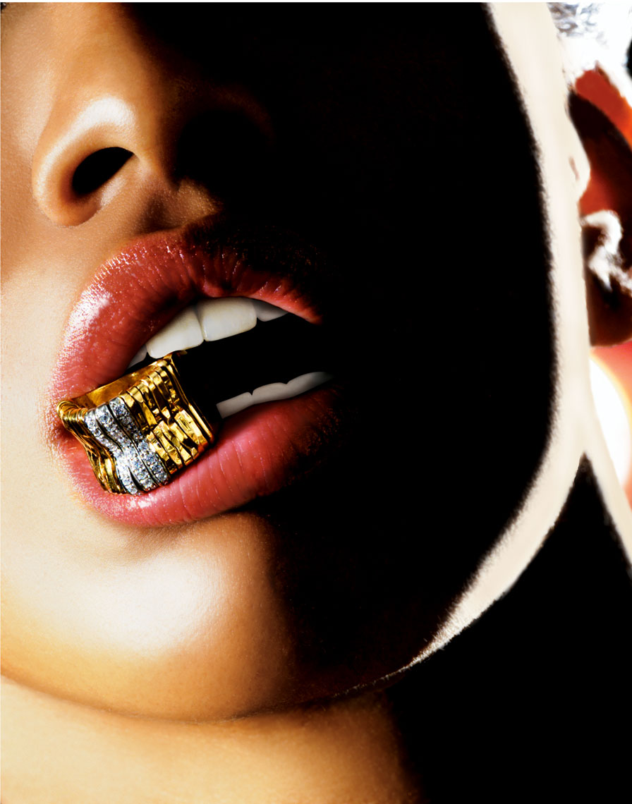 Woman with gold ring in mouth